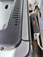 Raspberry Pi (with black and white case) _in situ_ Pine A64 Pi (with black and white case) _in situ_